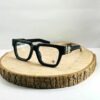Lunettes de vue noires style rétro avec décorations dorées